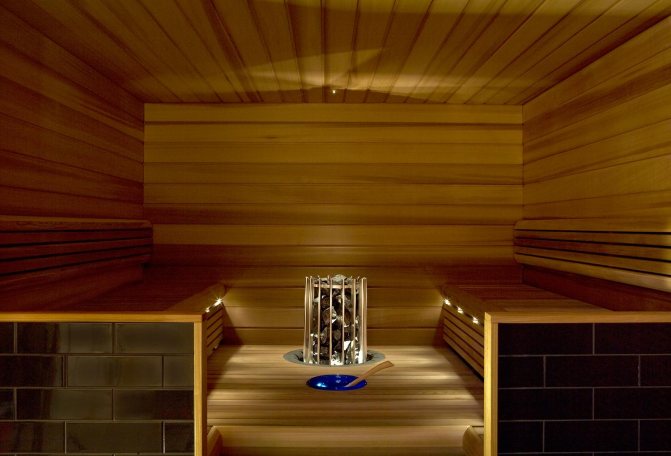 Chauffage à partir d'un poêle de sauna avec un circuit d'eau