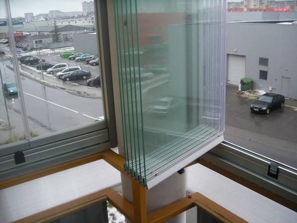 Panoramafönster på en balkong: typer och funktioner av teknik